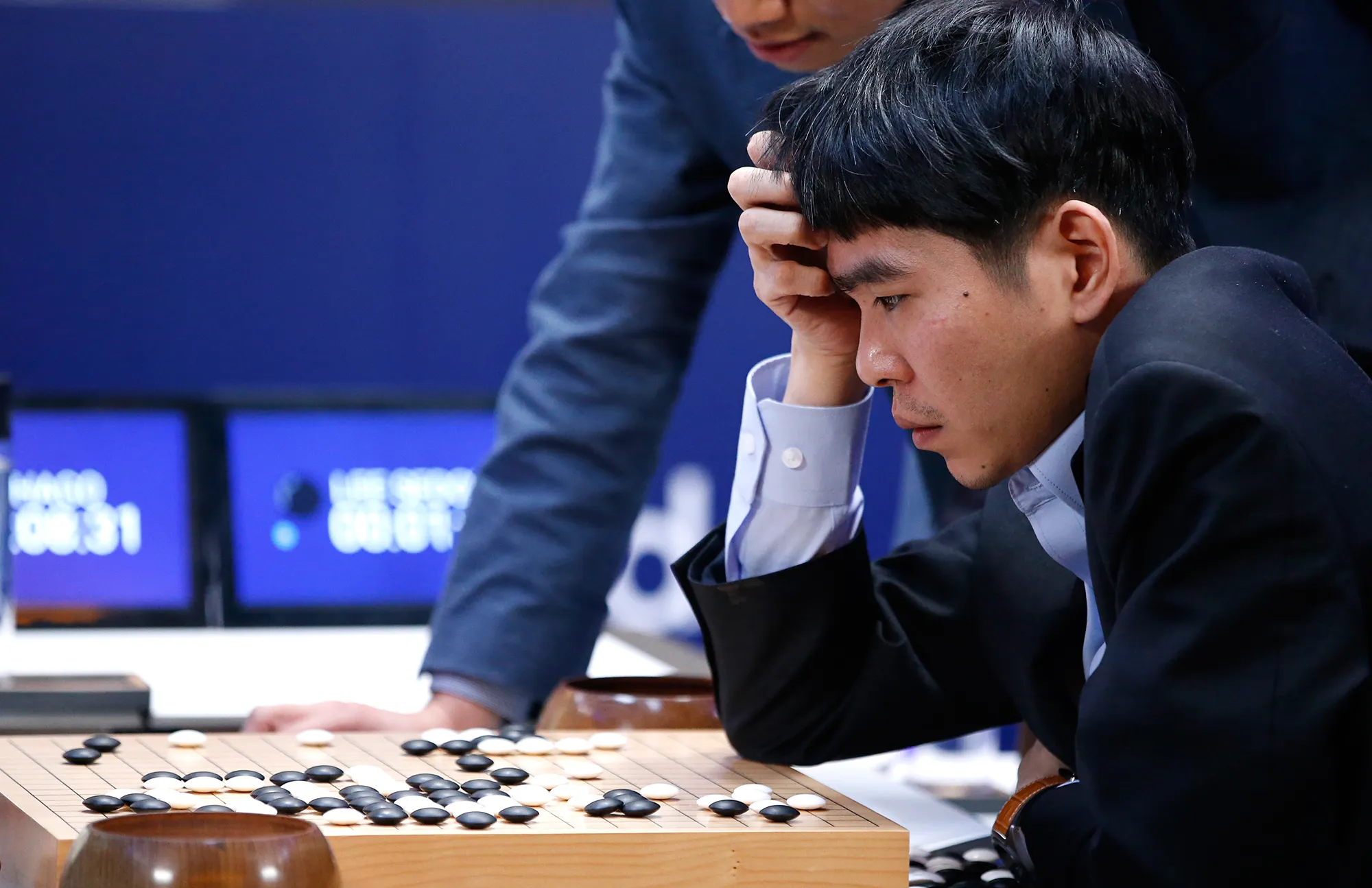 Lee Sedol reacting at the board during Game 2 against AlphaGo, March 10 2016.